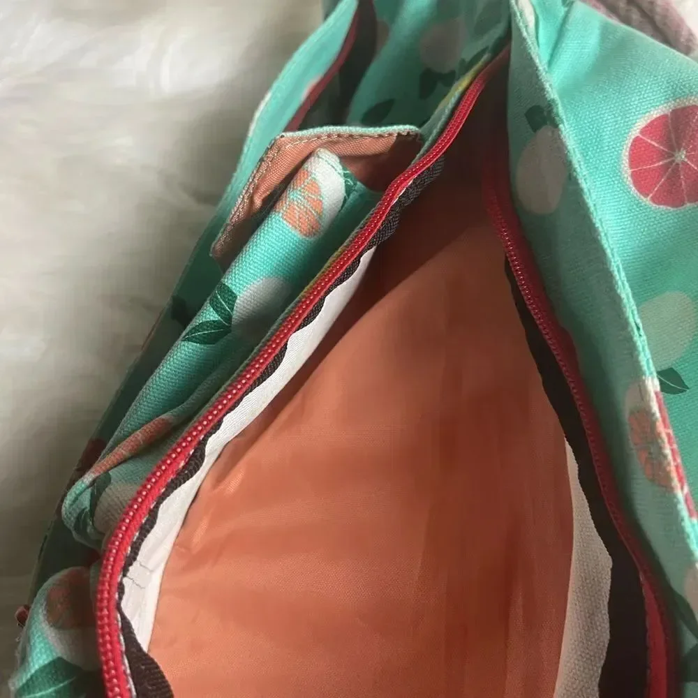 Kavu rope sling back canvas mint green with Orange,yellow, green fruit prints.